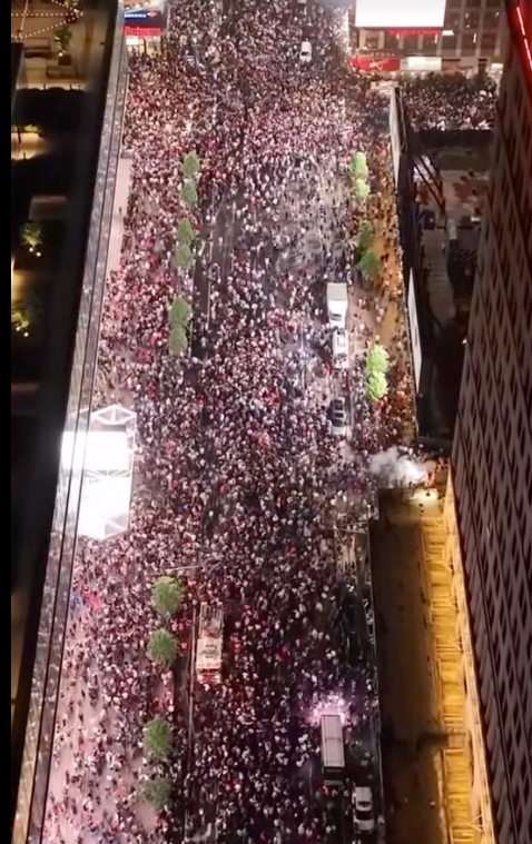 Aerial drone shot of Seventh Avenue packed with Knicks fans celebrating the team reaching the NBA Finals