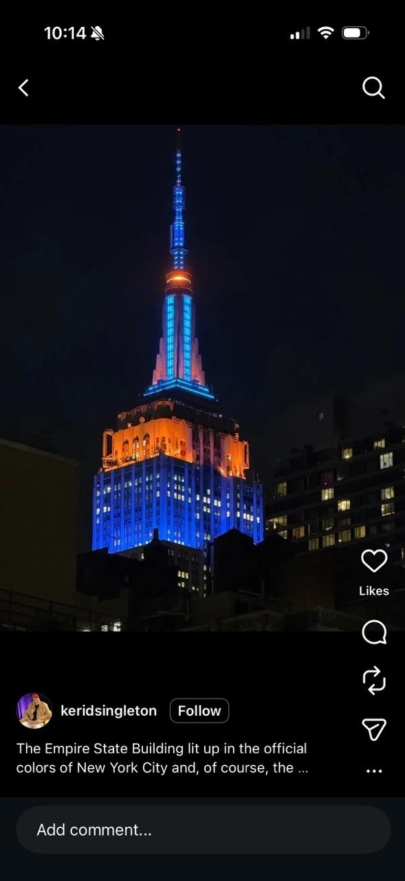 Empire State Building glowing blue and orange for the Knicks NBA Championship