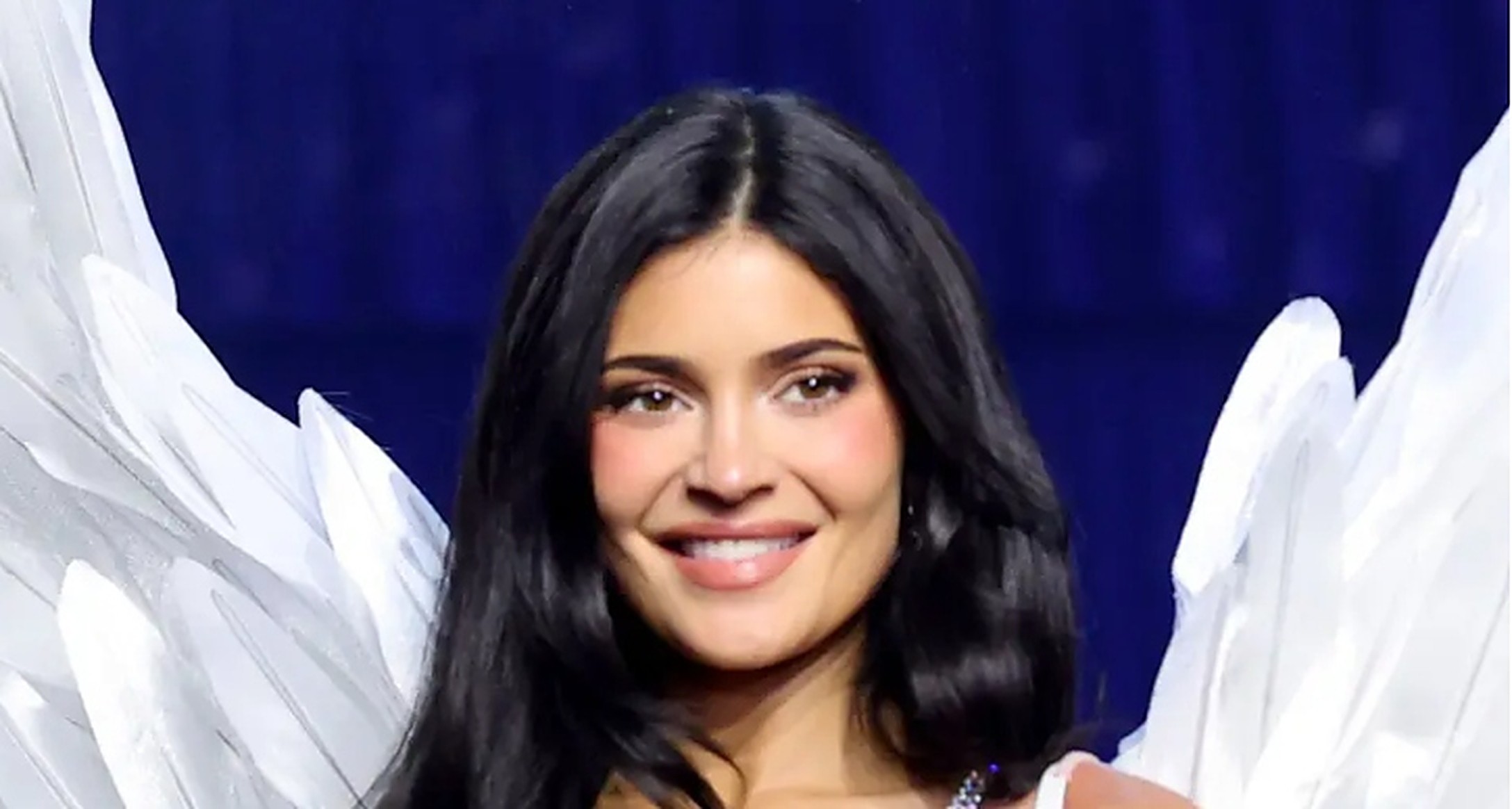 Kylie Jenner smiling on the Victoria's Secret runway
